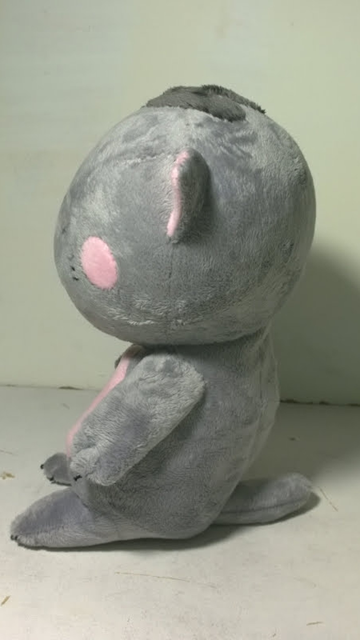 Grey anime-style cat plush with a big head and pink cheek, sewn by hand to order
