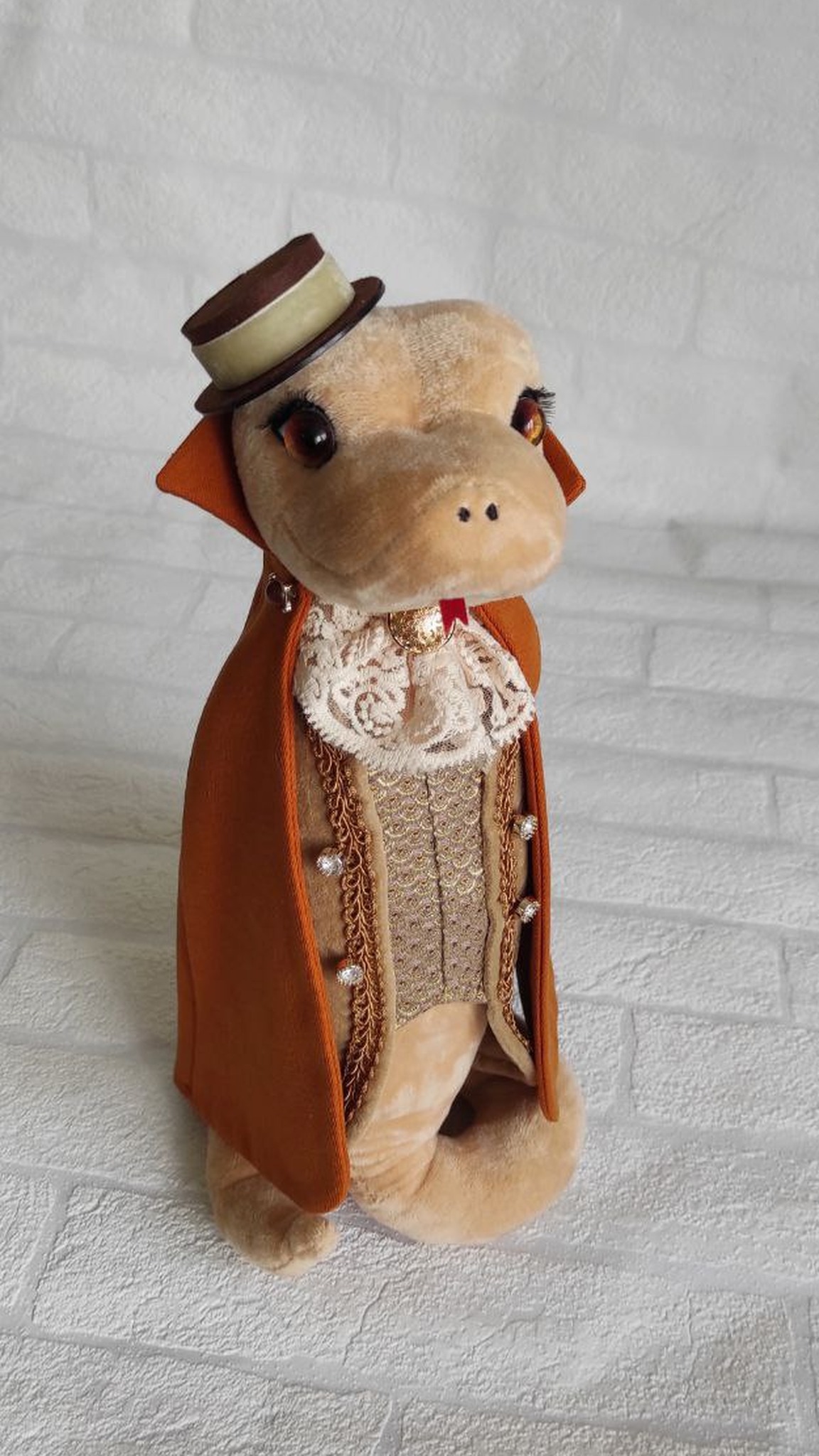 Snake plush gentleman in orange cape and top hat, custom corporate New Year gift sewn by hand
