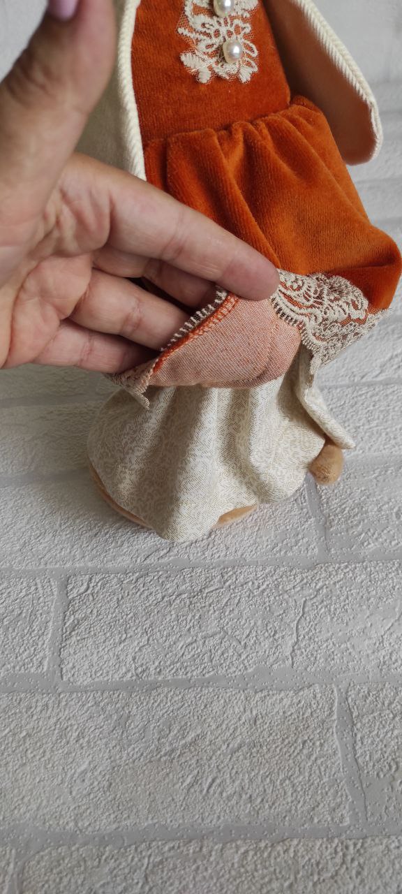 Snake plush lady lace underskirt Lace hem and cream underskirt of a snake plush lady dress, sewn by hand for a corporate New Year gift