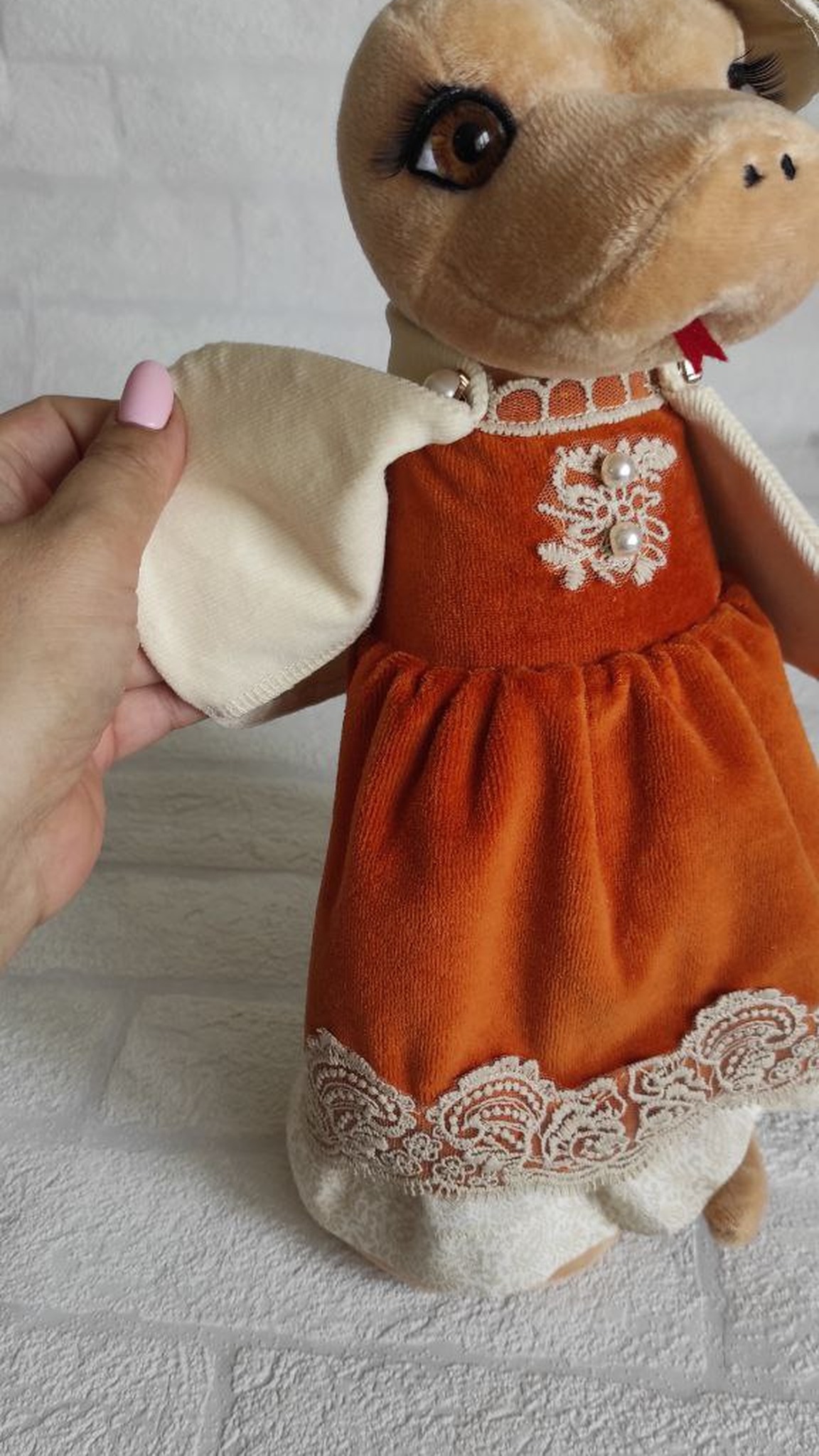Year of the Snake plush lady with cream cape and embroidered bodice, custom corporate gift