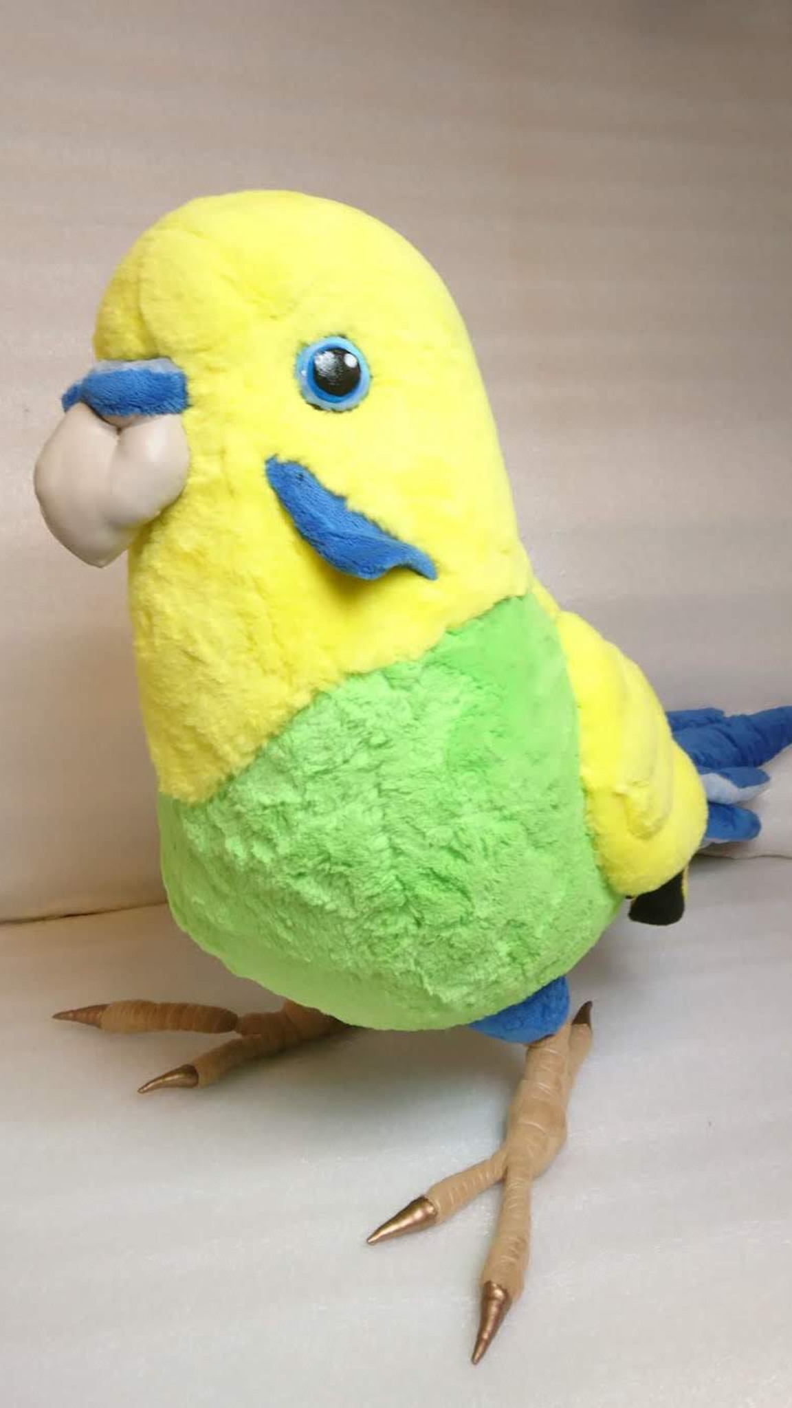 Soft budgie plush with a pale beak, blue cheek patch and lemon yellow faux fur head, made to order