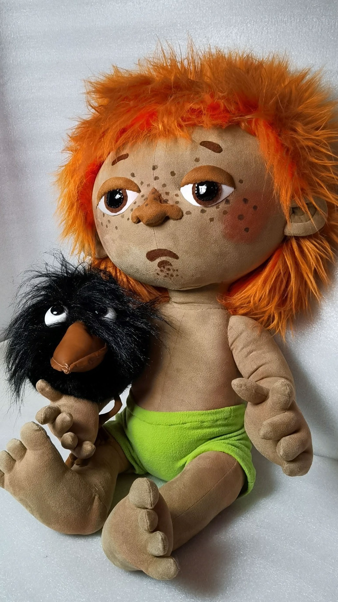 Poseable Antoshka doll sitting with bent legs next to his crow, Soviet cartoon character doll made to order