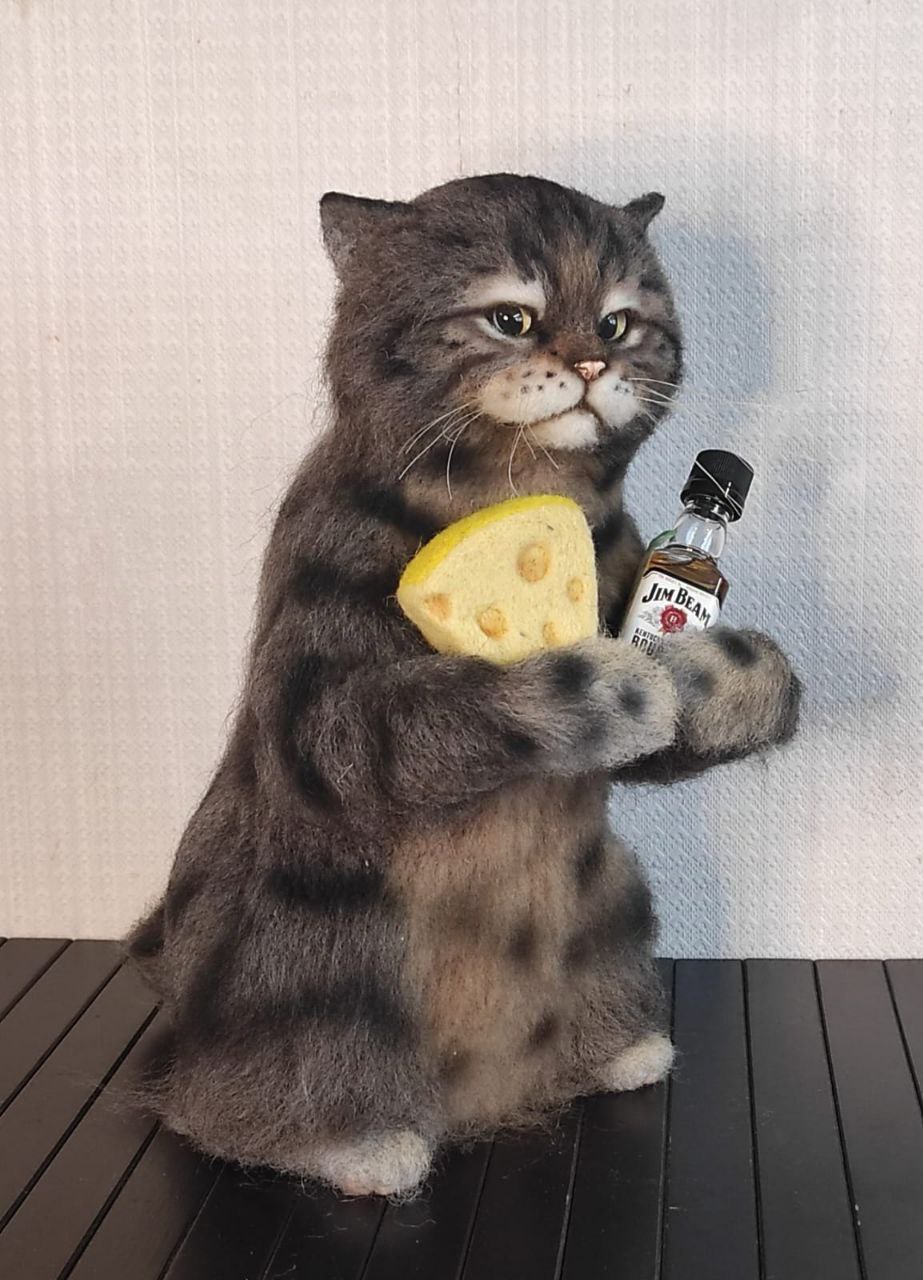 Sulky cat meme plush in grey faux fur Sulky cat meme plush in grey faux fur, made to order: striped tail, cheese wedge and tiny whisky bottle