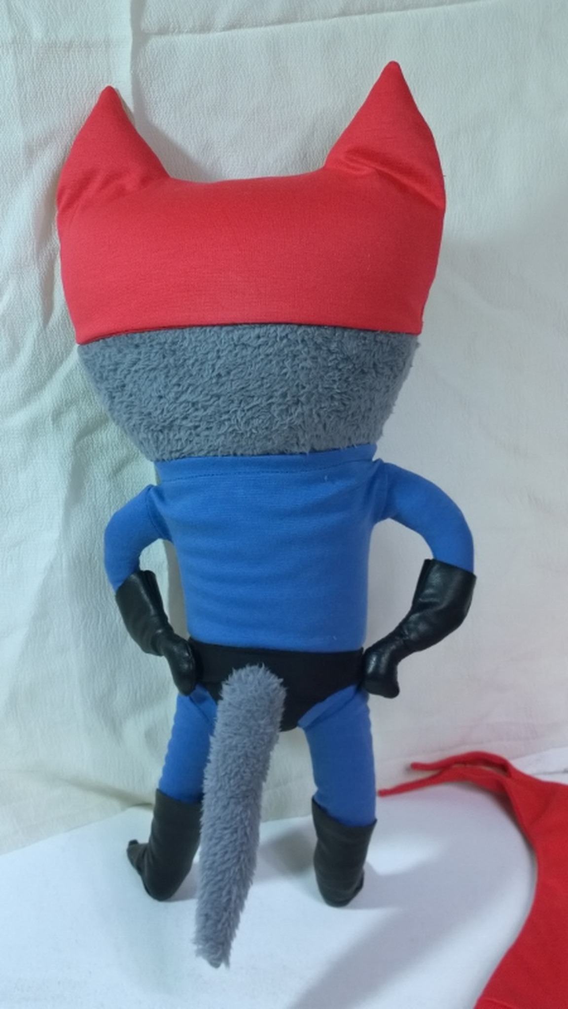 Superhero cat plush with the cape off and a fluffy grey faux fur tail, handmade to order from a drawing