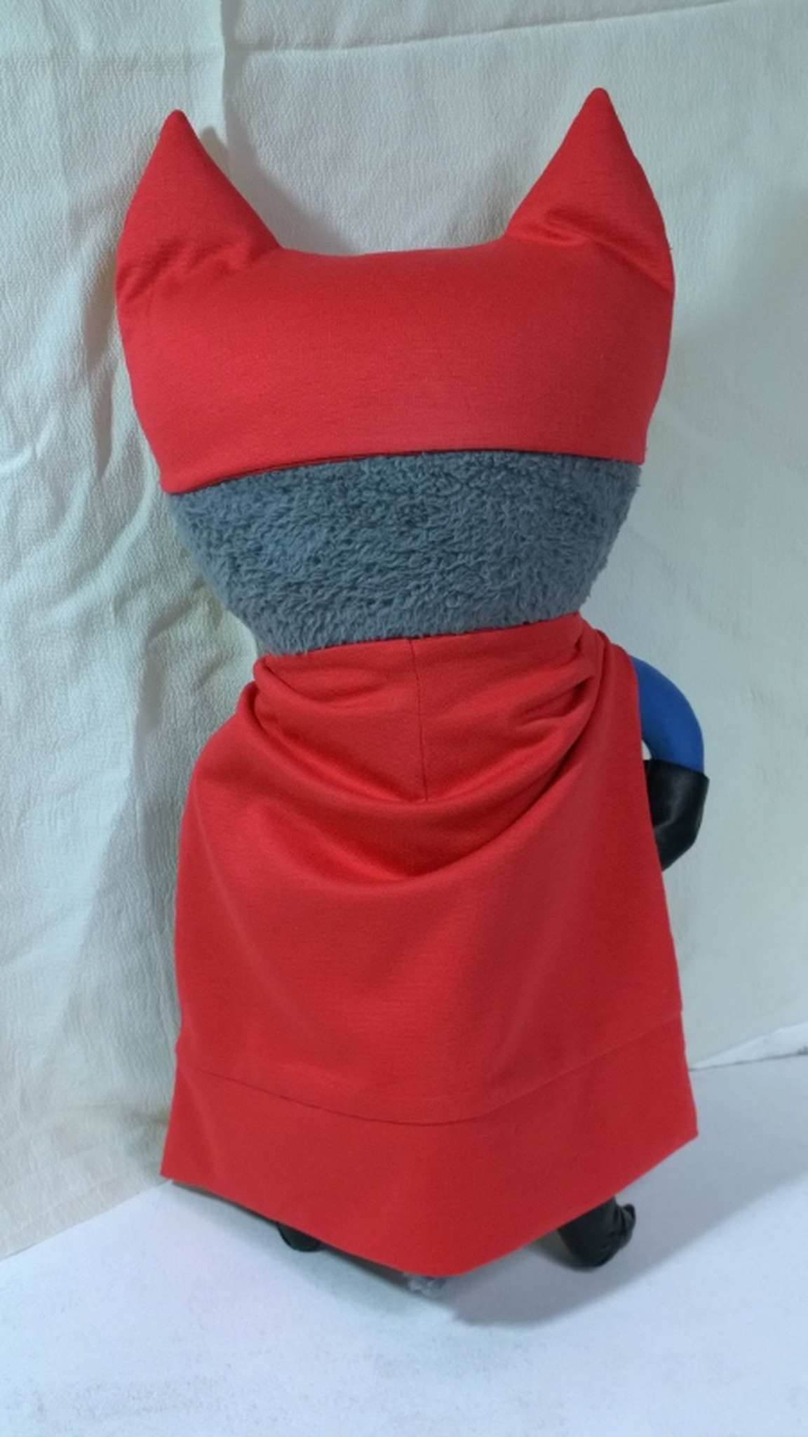 Cat superhero plush with a long red cape and a red mask with tall ears, sewn by hand to order
