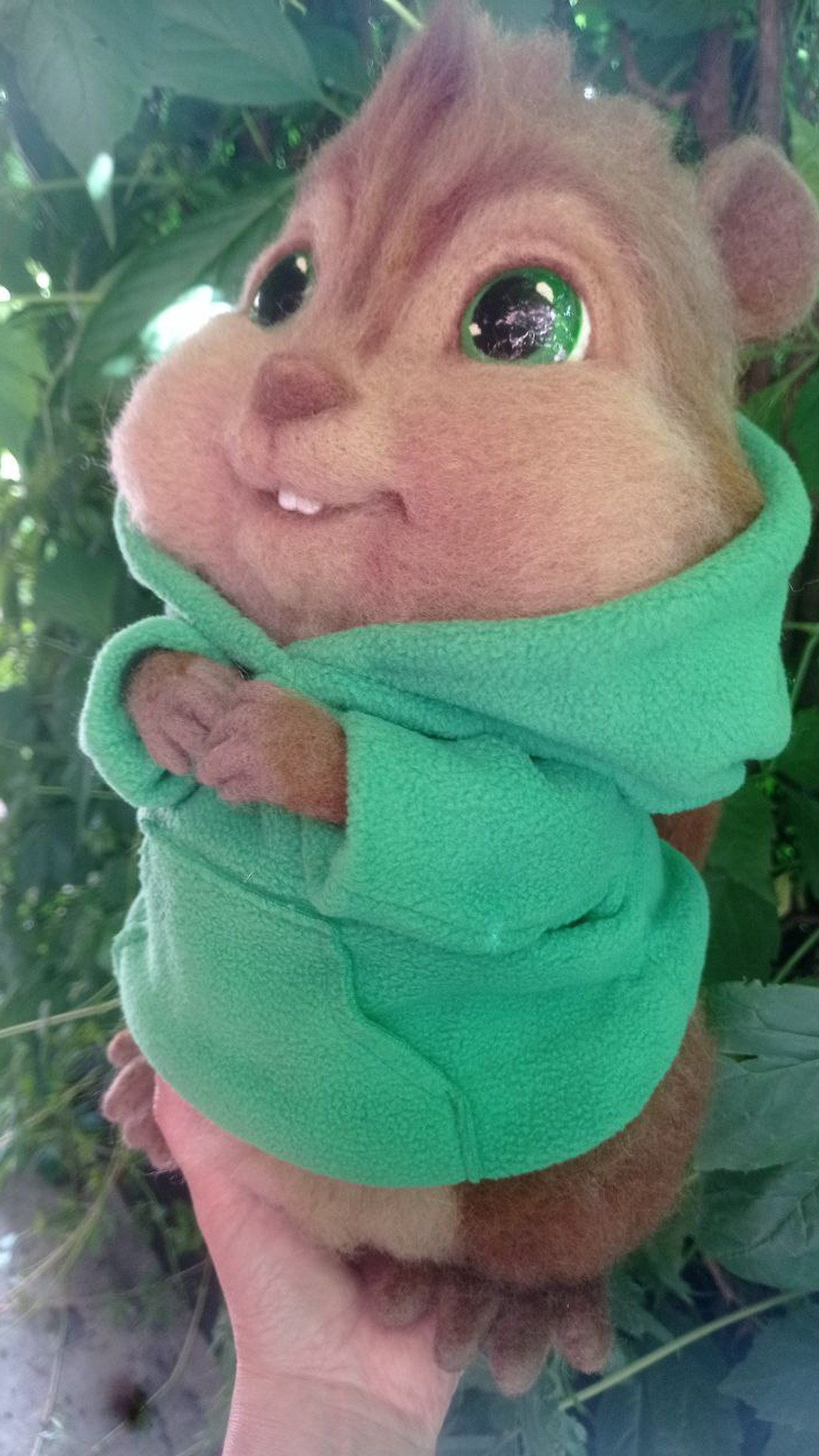 Felted Theodore chipmunk with his head tilted and paws at his chest, handmade Alvin and the Chipmunks plush