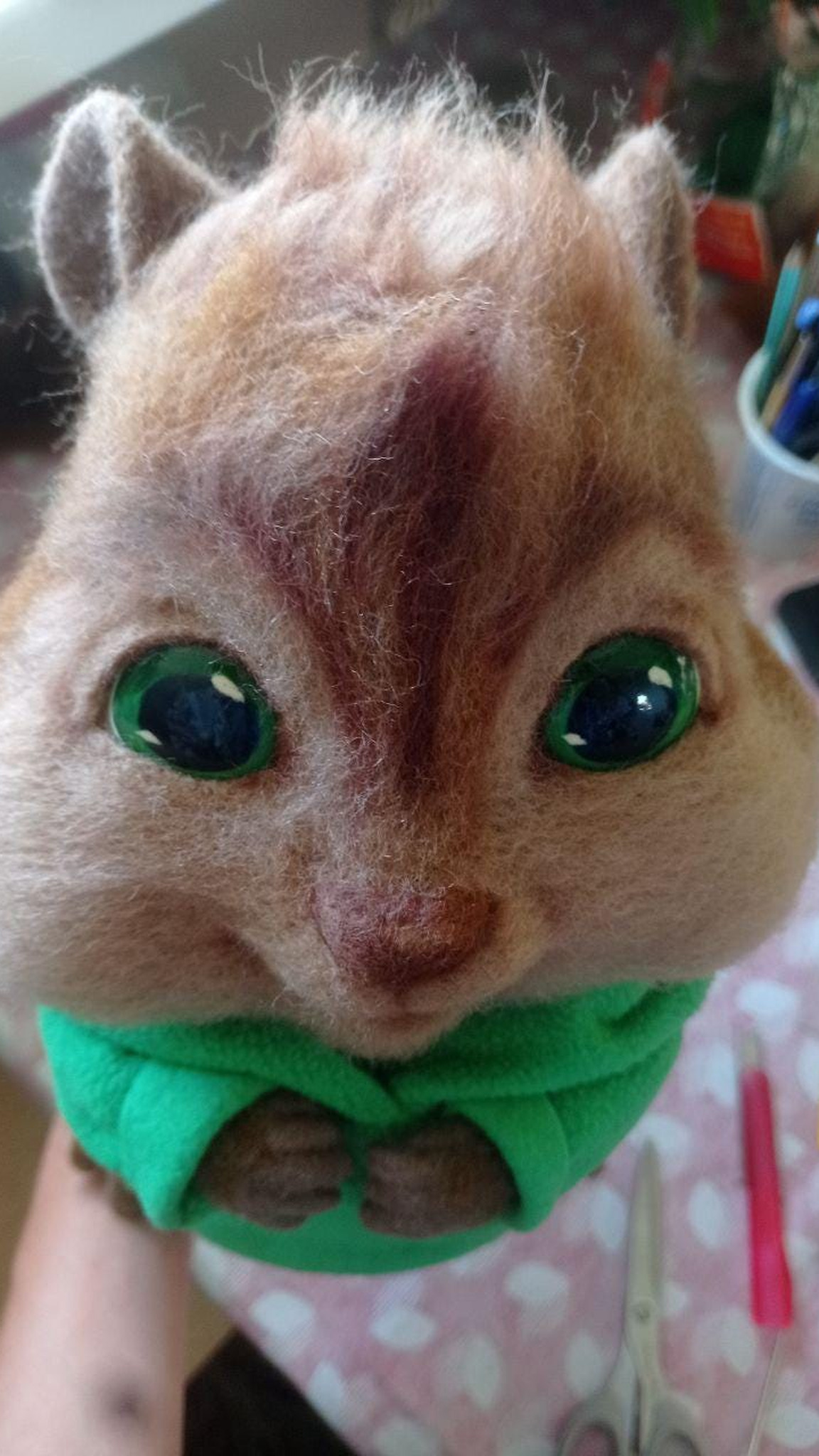 Needle felted Theodore face with green glass-like eyes and a pink-brown nose, custom chipmunk plush to order
