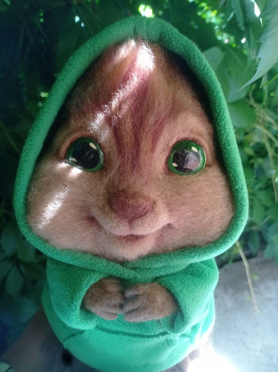 Theodore plush with big green eyes Theodore plush with big glossy green eyes under a green hood, needle felted Alvin and the Chipmunks toy