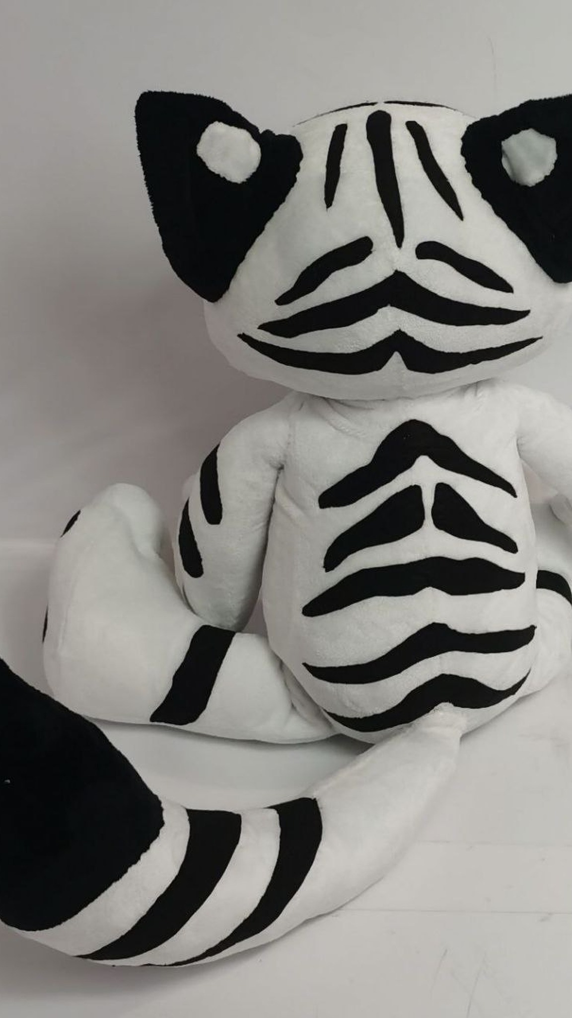 Tiger-fox fursona plush back with black stripes and a striped tail, custom made to order