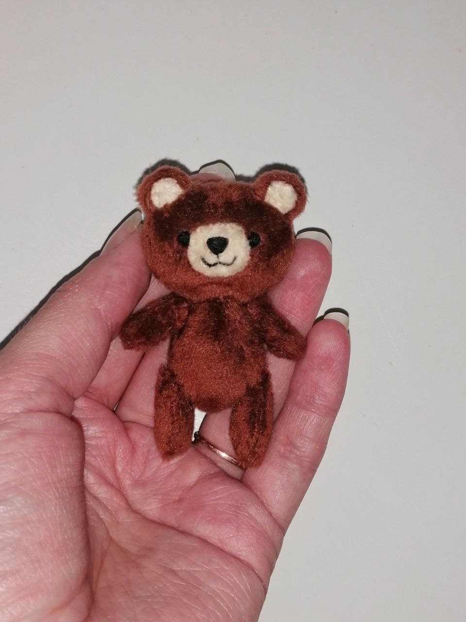 Tiny teddy bear for the sticker plush Palm-sized brown teddy bear with a cream muzzle, the accessory for a custom pink bunny sticker plush, handmade