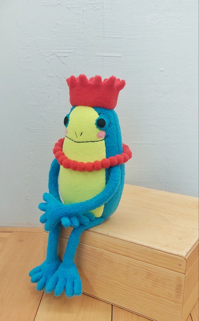 Turquoise frog princess plush Turquoise frog princess plush with a lime belly and soft red crown, second version of the sticker toy