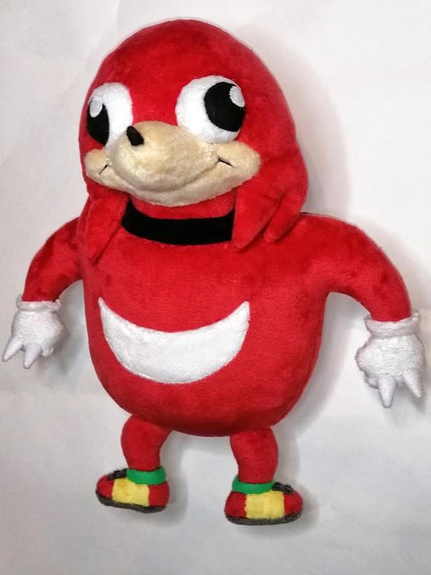 Ugandan Knuckles plush with a smirk Ugandan Knuckles plush with big round eyes, tan muzzle and a smirk, red meme Knuckles made to order