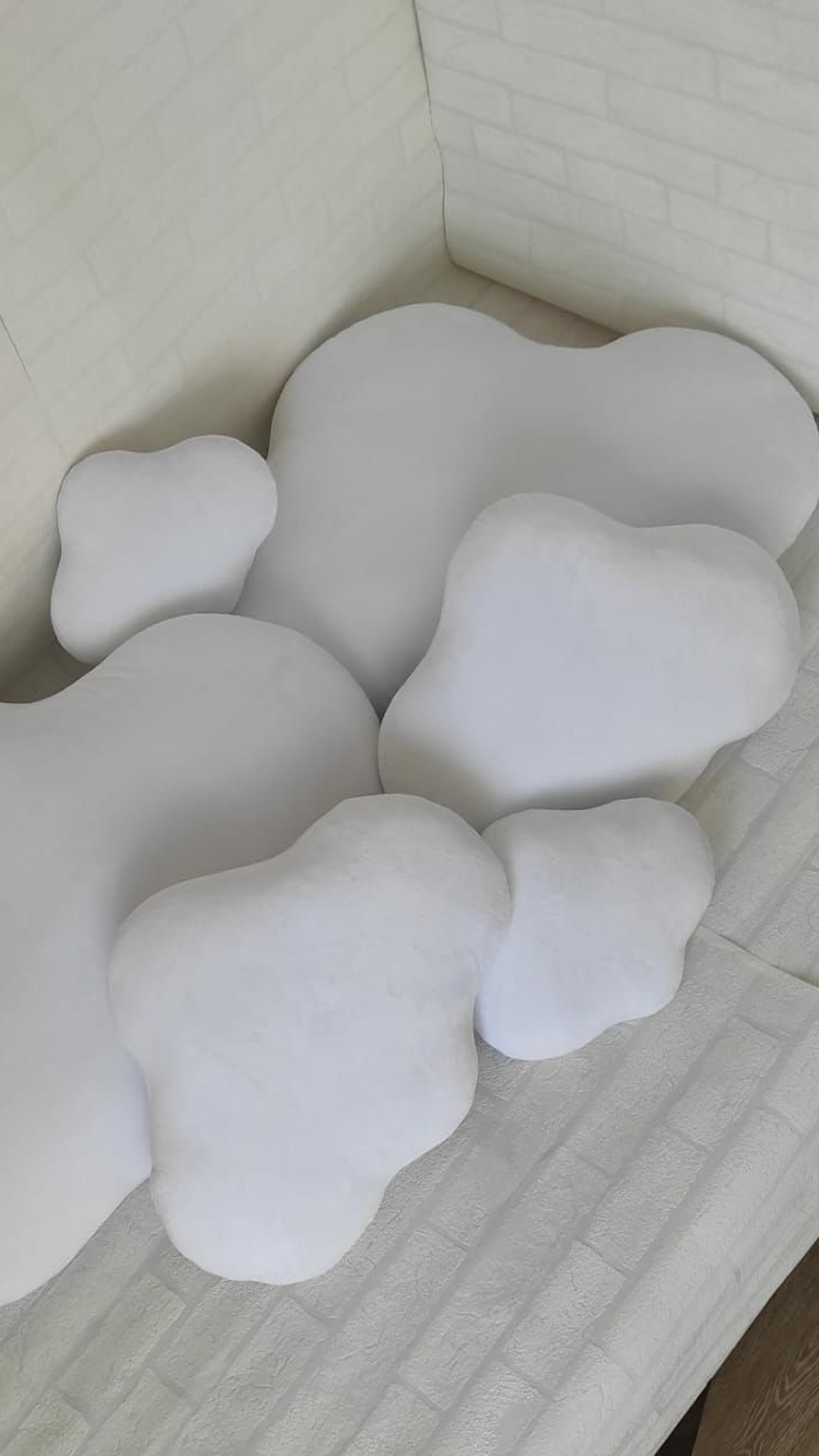 White cloud plush pillows in several sizes, sewn to order as part of a soft brand decor set