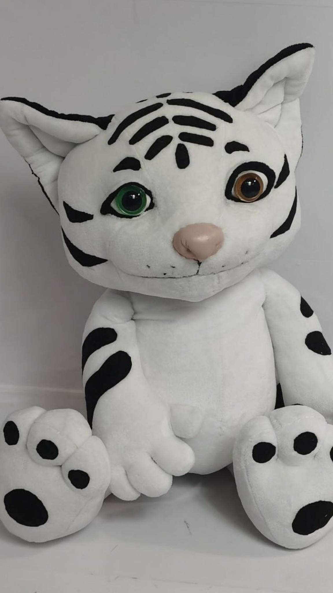 White tiger-fox fursona plush with odd eyes, green and golden, and black stripes, made to order