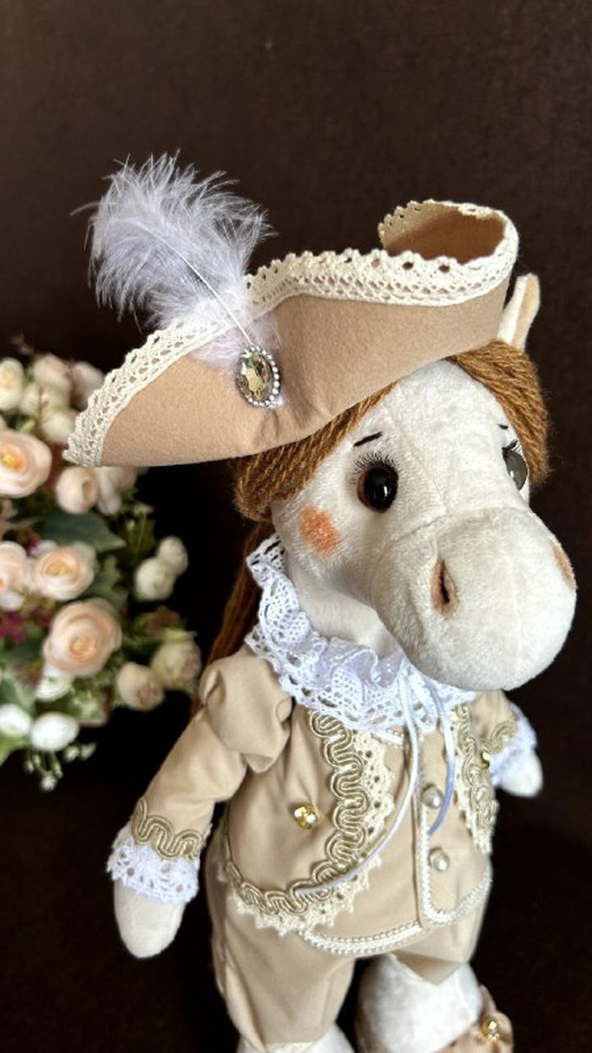 Year of the Horse plush stallion with a cream face, pink cheeks and a feathered hat, sewn to order