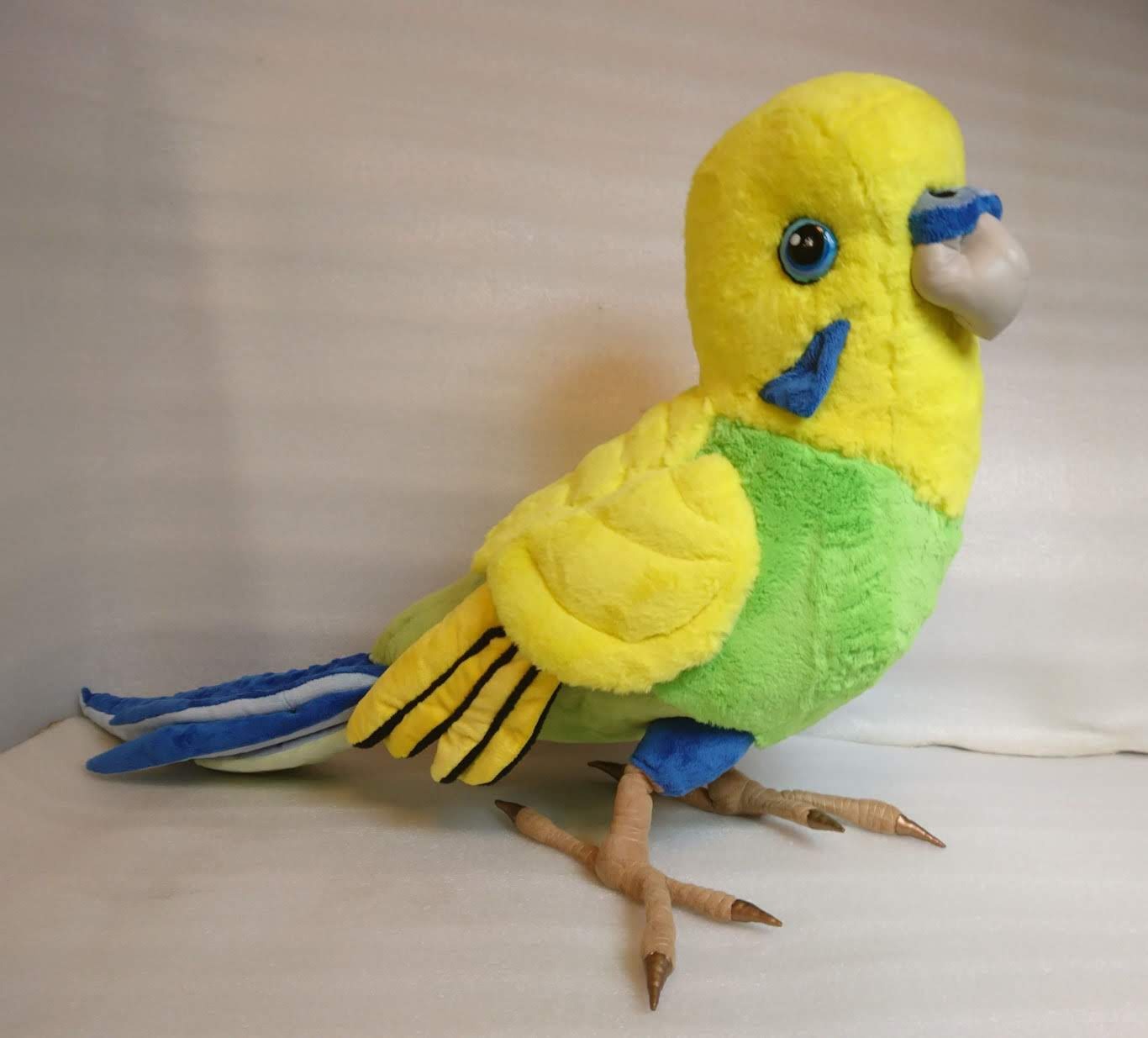 Plain yellow and green budgie plush Plain yellow and green budgie plush with a long blue tail and black wing bars, sewn by hand to order