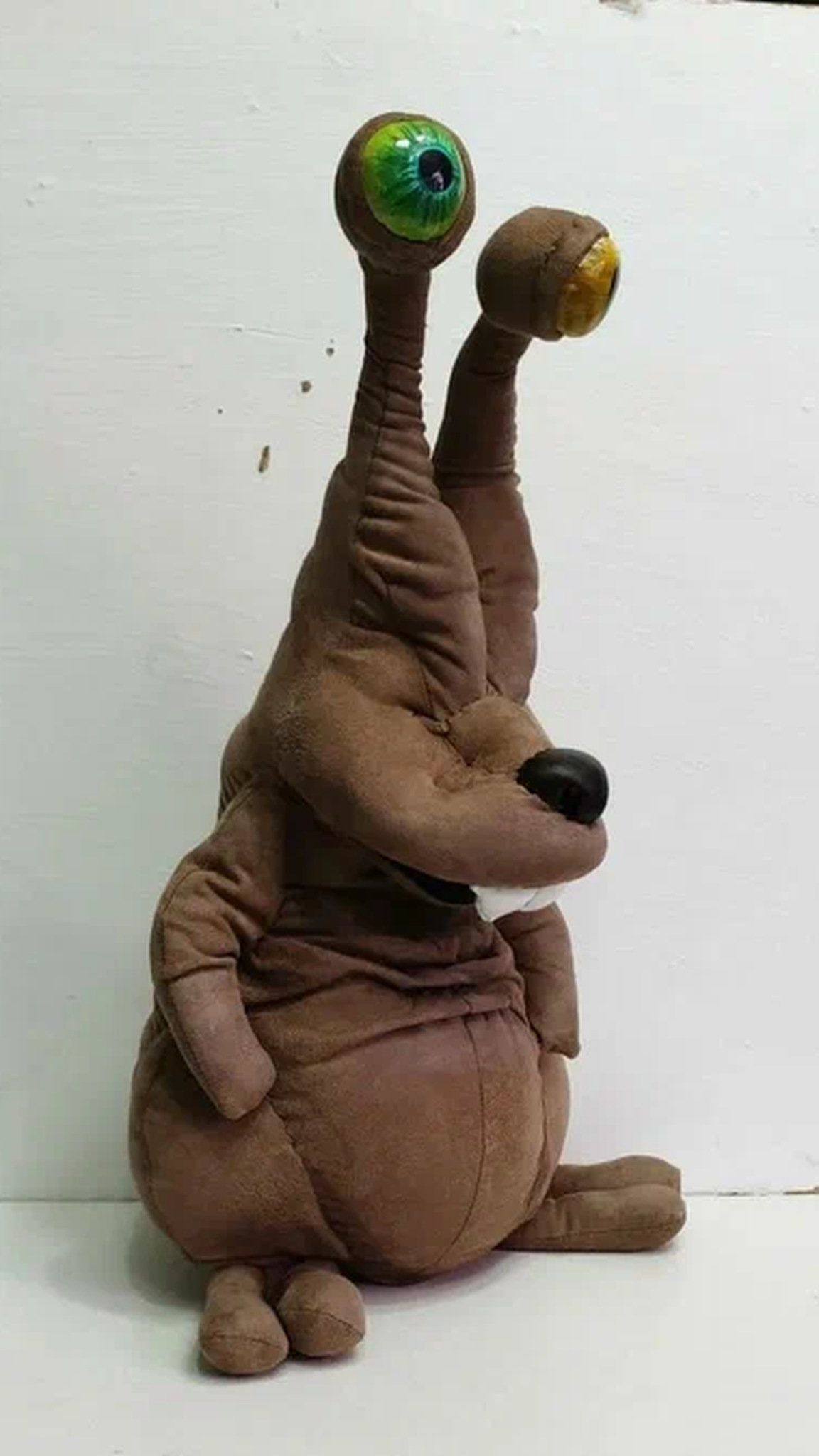 Zuzya snail-rabbit plush with long eye stalks, black nose and wrinkled brown body, custom made to order